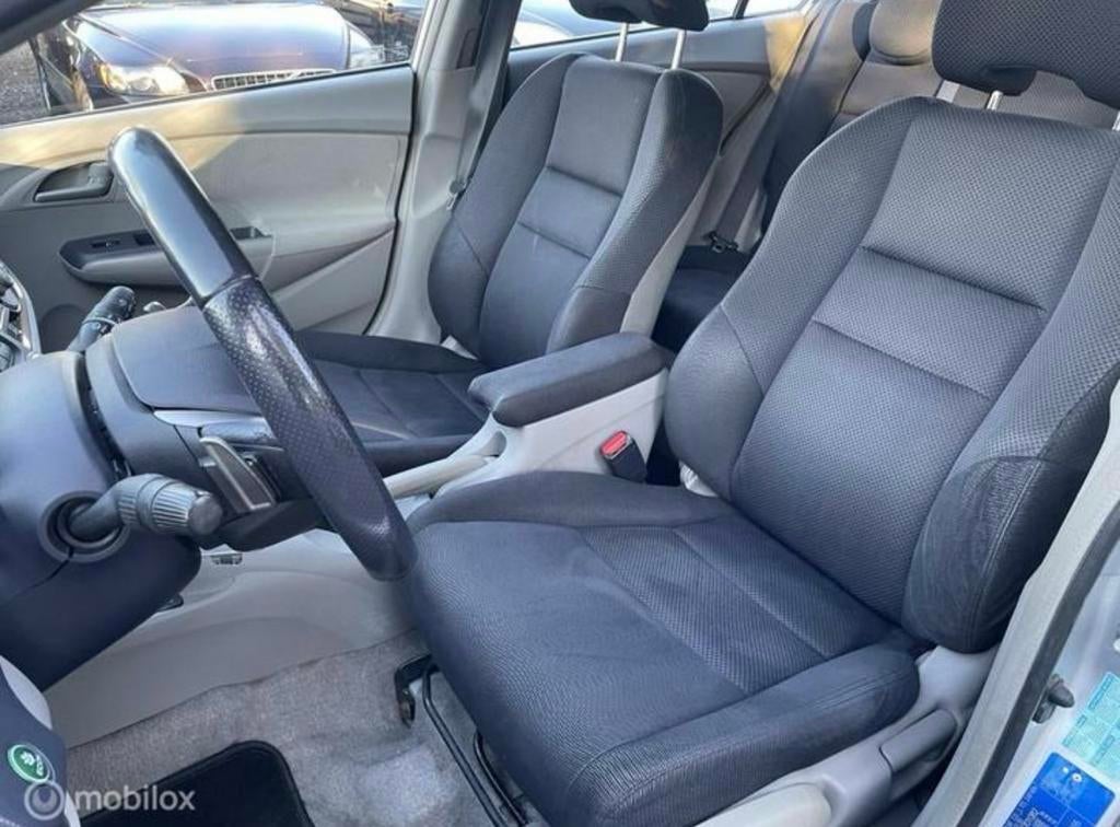 Honda Insight 1.3 Hybrid AUT 2009 Grijs, 4 cilinders, Xenon verlichting, Grijs, 22 km/l