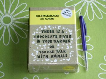 Nieuw in seal: Dilemmarama - the happy edition Engelstalig beschikbaar voor biedingen