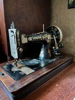 Antieke naaimachine, Ophalen