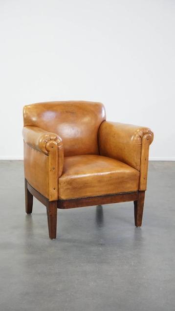 Gerestaureerde antieke Art Deco schapenleren fauteuil beschikbaar voor biedingen