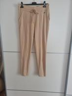 Angelle Milan travel broek maat M, Kleding | Dames, Maat 38/40 (M), Beige, Ophalen of Verzenden, Zo goed als nieuw