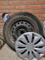 Winterbanden met velgen icl wieldoppen en velgen, Ophalen, Zo goed als nieuw