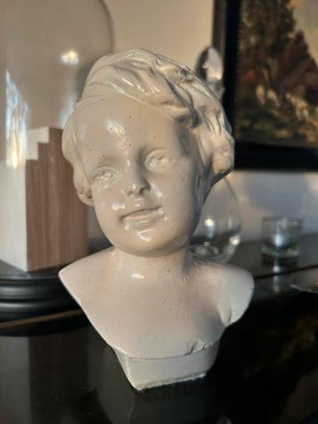 Kinderhoofdje als decoratie beschikbaar voor biedingen