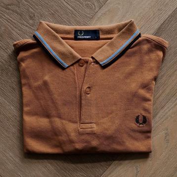 Gave Fred Perry herenpolo. Als nieuw in de kast.Mosterd geel beschikbaar voor biedingen