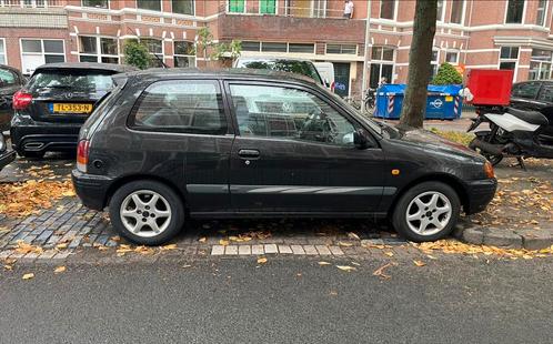 Toyota Starlet 1.3 16V 1998 Zwart, Auto's, Toyota, Particulier, Starlet, Airbags, Centrale vergrendeling, Trekhaak, LPG, Hatchback
