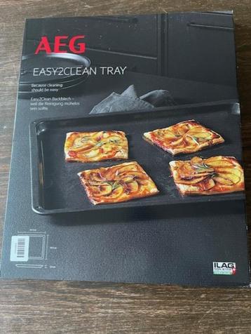 Gloednieuwe AEG Easy2Clean bakplaat te koop- beschikbaar voor biedingen
