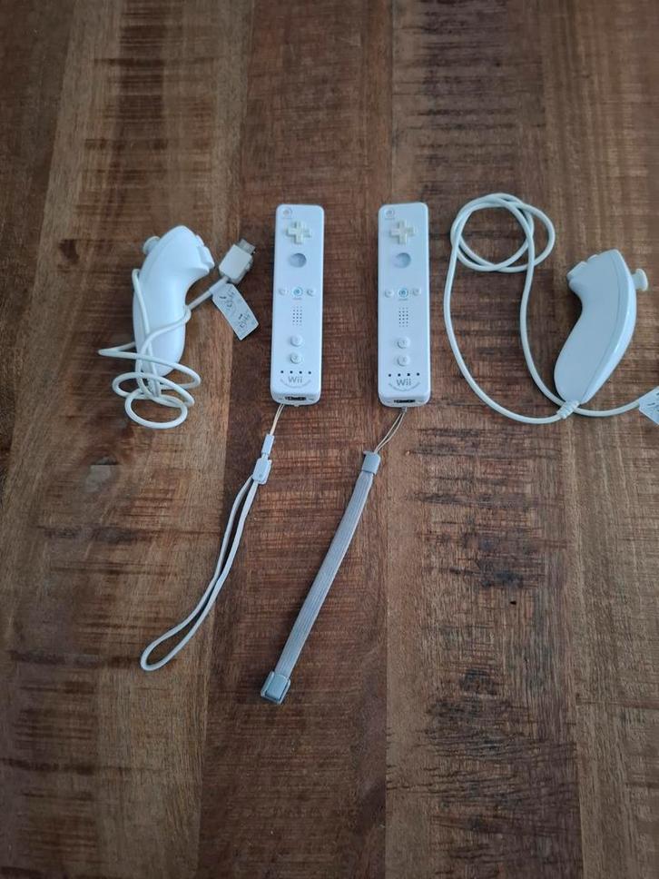 Nintendo wii motion controller setje met nunchucks., Spelcomputers en Games, Games | Nintendo Wii, Zo goed als nieuw, Overige genres