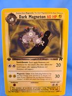 Dark Magneton 28/82 - Team Rocket (1st edition), Hobby en Vrije tijd, Verzamelkaartspellen | Pokémon, Gebruikt, Losse kaart, Verzenden