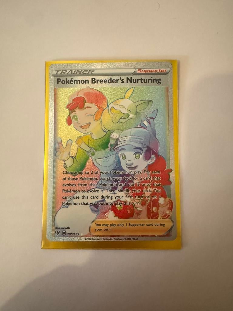 Pokemon Breeder’s Nurturing 195/189 Pokemonkaart, Hobby en Vrije tijd, Verzamelkaartspellen | Pokémon, Ophalen of Verzenden, Zo goed als nieuw