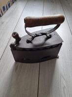 Antiek strijkijzer, Ophalen
