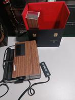 Prestinox diaprojector, Ophalen