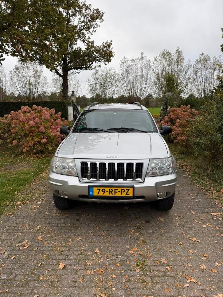Jeep Grand Cherokee 4.7 I V8 Overland AUT 2005 Grijs, Auto's, Jeep, Particulier, Grand Cherokee, Benzine, G, SUV of Terreinwagen