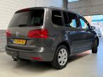 Volkswagen Touran 1.2 TSI Comfortline BlueMotion 7p., Voorwielaandrijving, Euro 5, Stof, Zwart