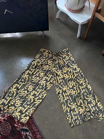 Nieuwe wikkelbroek one size geel zwart wit motief beschikbaar voor biedingen