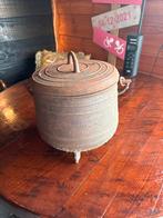 Oude ijzeren pot met deksel, Ophalen