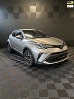 Toyota C-HR 1.8 Hybrid TeamNL | Navi | Led | Stoelverwarming, Auto's, Toyota, Te koop, 98 pk, Zilver of Grijs, 1355 kg