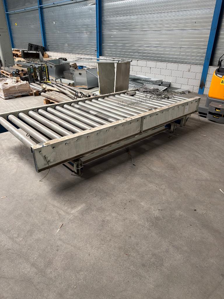 Rollenbaan aangedreven met weegschaal, Ophalen