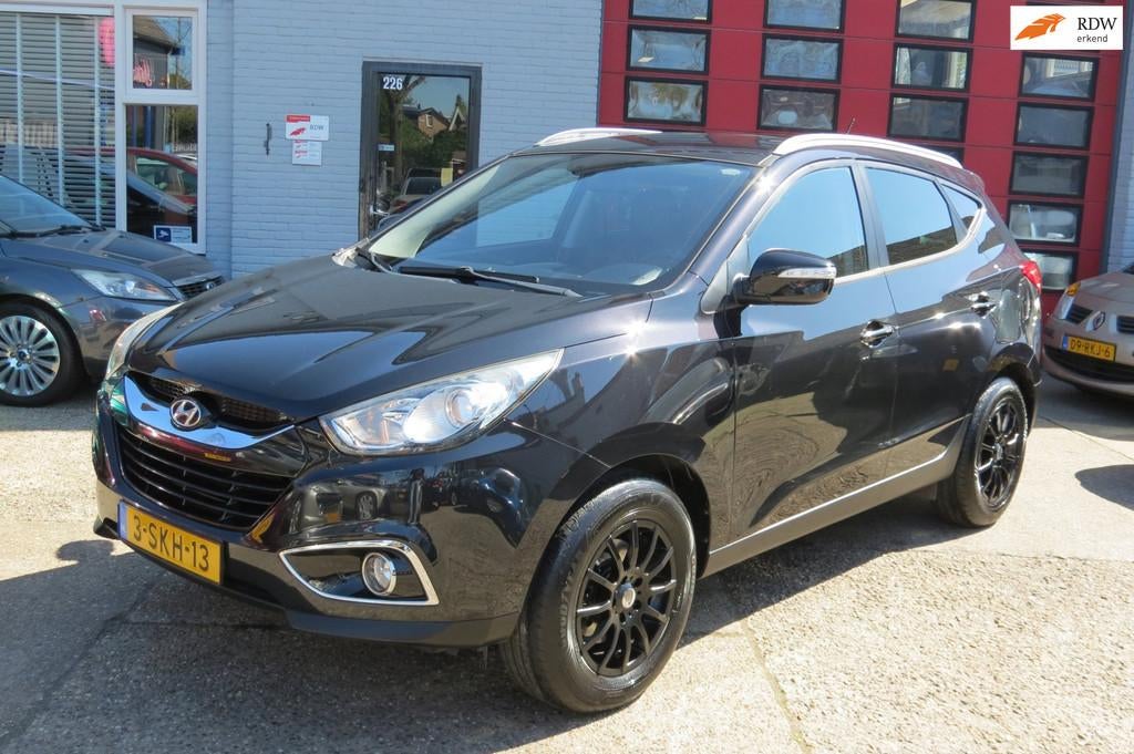 Hyundai Ix35 2.0i Style AUTOMAAT ,, Euro 5, Gebruikt, 4 cilinders, Leder en Stof