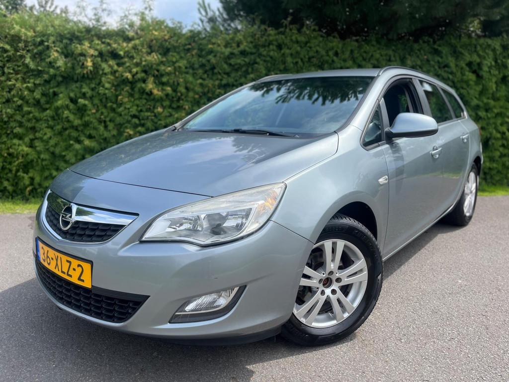 Opel Astra Sports Tourer 1.4 Business + NAVIGATIE AIRCO NAP, Auto's, Voorwielaandrijving, Euro 5, 101 pk, Gebruikt