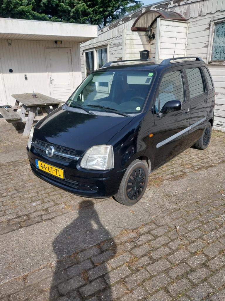 Opel Agila 1.2 I 16V 2003 Zwart apk februari 2027, Voorwielaandrijving, Zwart, Origineel Nederlands, Bedrijf