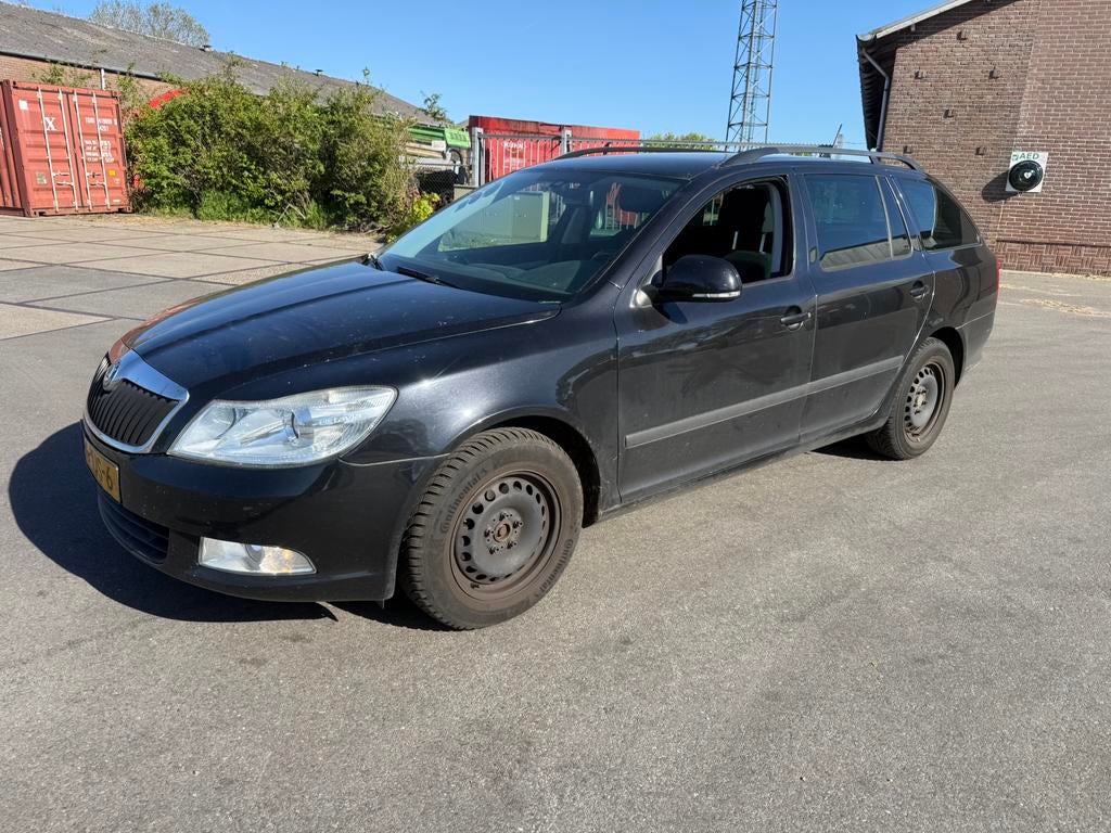 Skoda Octavia 1.6 TDI 77KW Combi Greentech 2012 Zwart, Voorwielaandrijving, Euro 5, Stof, 4 cilinders