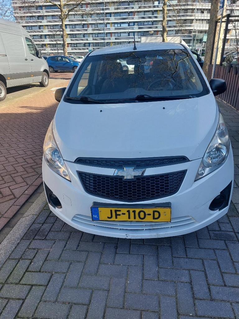 Chevrolet Spark 1.0 Bifuel 2011 Wit, Auto's, Voorwielaandrijving, Stof, 4 cilinders, Particulier