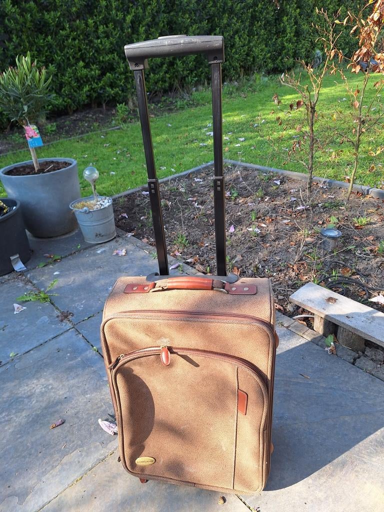 Rol koffer, Ophalen, Leer