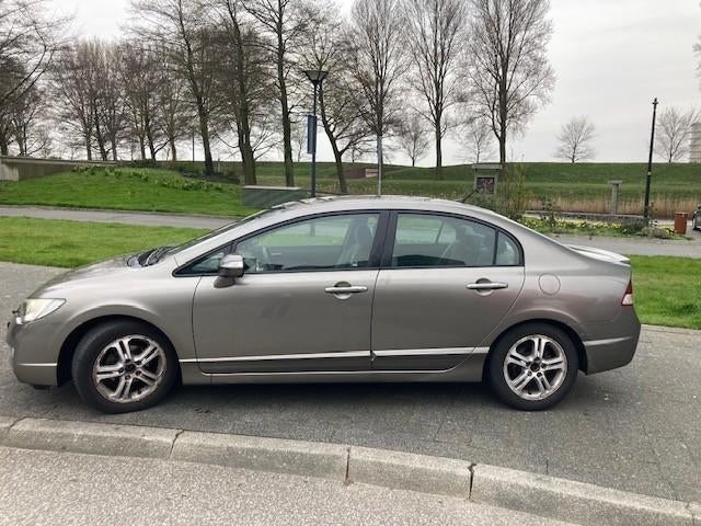 Honda Civic 1.3 Vtec Hybrid 4DR C-tr. 2008 Grijs, Auto's, Stof, Beige, Origineel Nederlands, 22 km/l