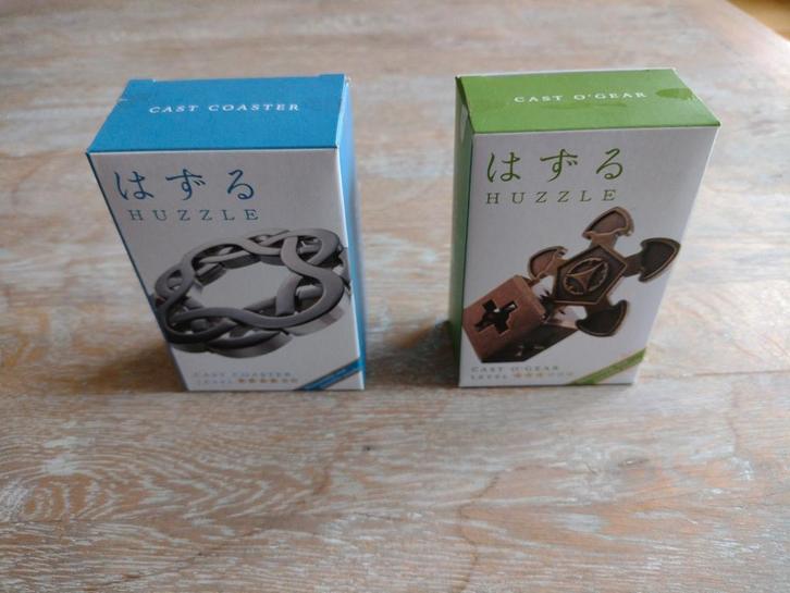 2 x Hanayama Huzzle puzzles, Hobby en Vrije tijd, Denksport en Puzzels, Nieuw, Rubik's of 3D-puzzel, Minder dan 500 stukjes, Ophalen of Verzenden