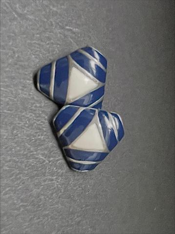 Vintage geometrische clipoorbellen beschikbaar voor biedingen