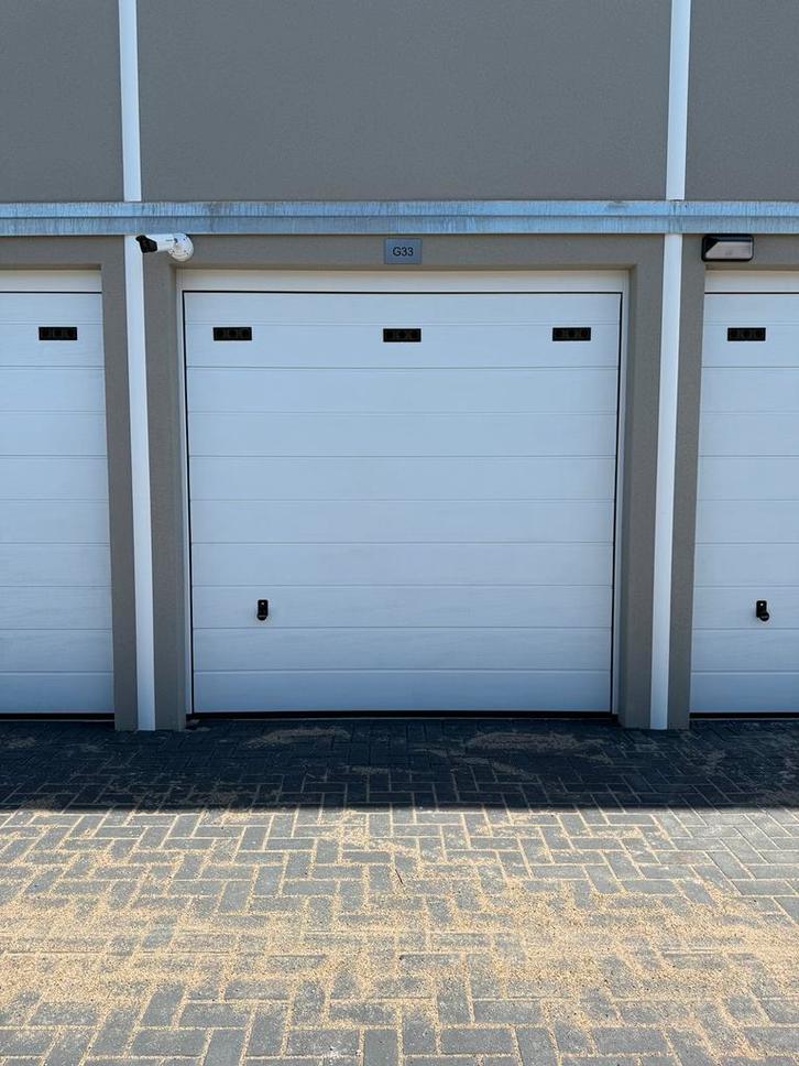 Te huur; Nieuwe garagebox 21m met elektra en water, Auto diversen, Autostallingen en Garages