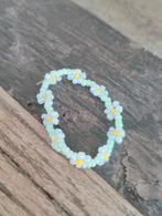 Schattig bloemen armbandje, Sieraden, Tassen en Uiterlijk, Armbanden, Blauw, Kunststof of Plastic, Nieuw, Ophalen of Verzenden