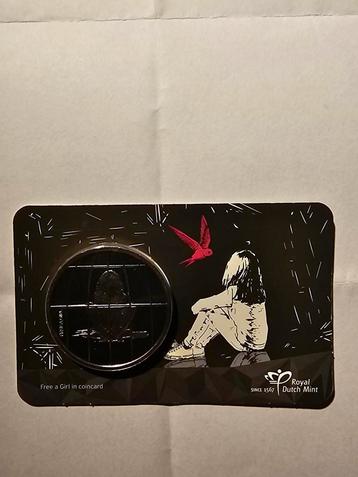 Free a Girl penning in coincard  beschikbaar voor biedingen