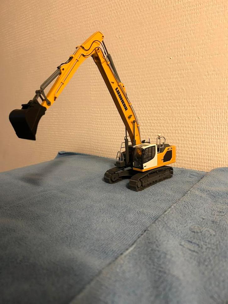 Liebherr 938 semi longreach, Hobby en Vrije tijd, Modelauto's | 1:50, Zo goed als nieuw, Bus of Vrachtwagen, Conrad, Ophalen of Verzenden