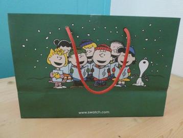 CADEAU-tas kerst afb.:Peanuts-koor met Charley Brown papier beschikbaar voor biedingen
