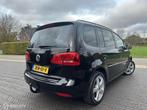 Volkswagen Touran 1.4 TSI DSG 170pk! 7-personen Leer Pano, Gebruikt, Met garantie (alle), 7 stoelen, Zwart