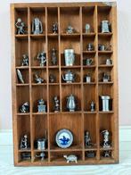 Letterbak met tinnen miniaturen, Ophalen