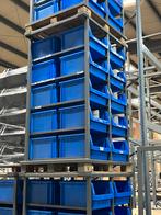 Magazijnstelling met blauwe bakken., Ophalen of Verzenden