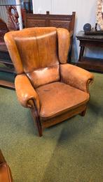 Schapenlederen oor fauteuil, Ophalen