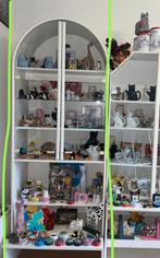 Verzameling poezenbeeldjes, Ophalen