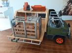 Schleich Wild Life onderzoek truck. Incl kooi en leeuwin, Ophalen of Verzenden, Zo goed als nieuw
