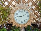 vintage goudkleurige zon grote wandklok, Ophalen of Verzenden, Gebruikt, Wandklok