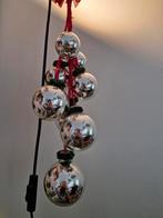 Trosje kerstballen, Ophalen