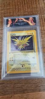 Zapdos Fossil #15 NL 1st Edition Bonfire NM, Ophalen of Verzenden, Zo goed als nieuw, Losse kaart, Foil