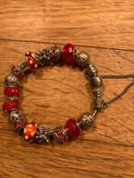 Armband met rode stenen en veiligheidssluiting., Ophalen of Verzenden, Zo goed als nieuw, Rood, Zilver