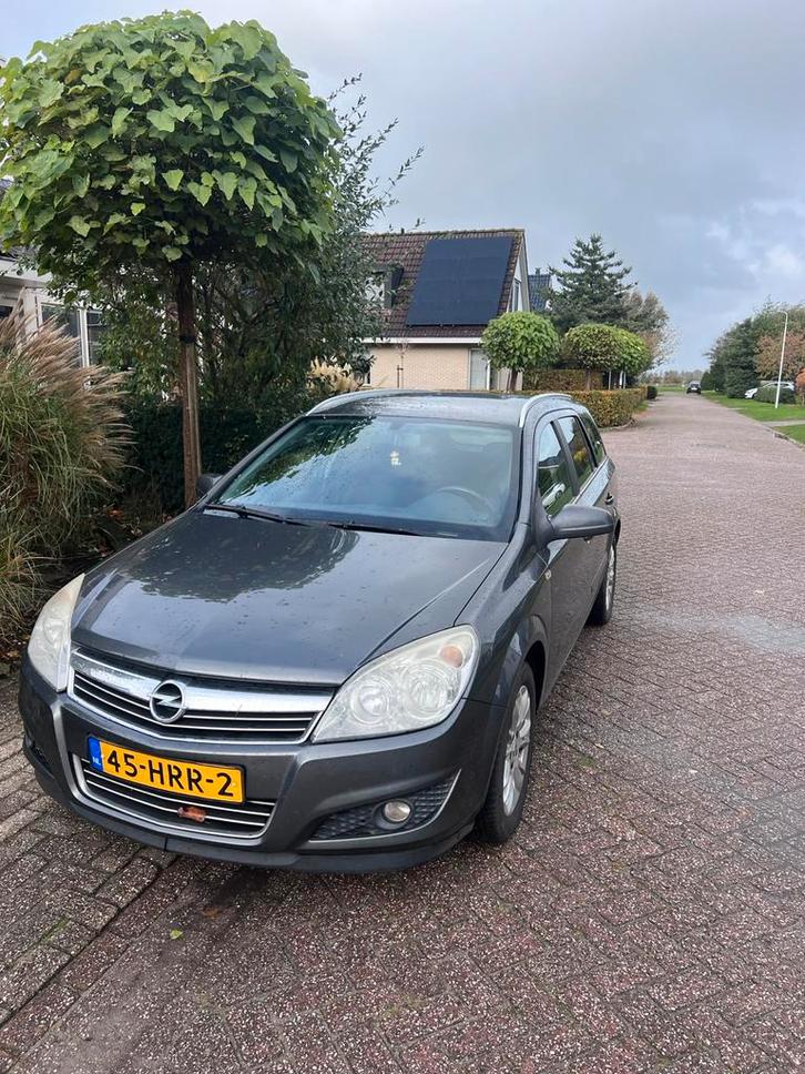 Opel Astra 1.6 16V 85KW St.wgn. 2009 Grijs, Auto's, Opel, Particulier, Astra, Benzine, B, Stationwagon, Handgeschakeld, Origineel Nederlands