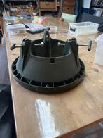 Kerstboom houder, Ophalen