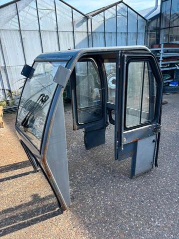 Cabine voor een shovel trekker ?? beschikbaar voor biedingen