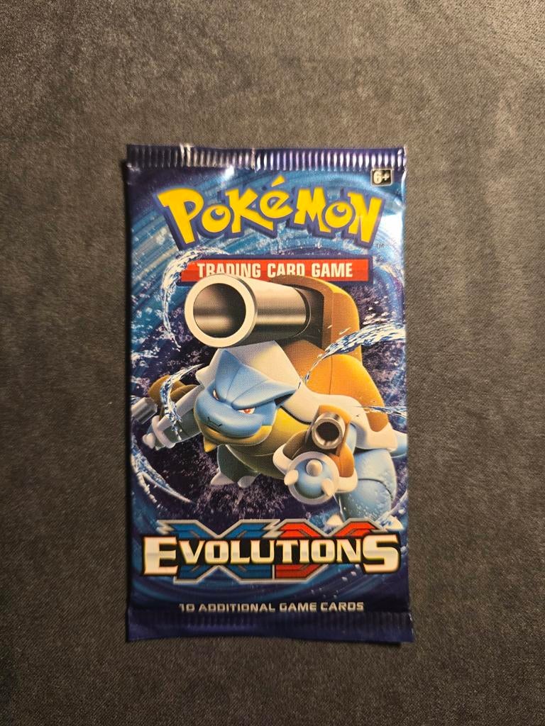 Sealed Pokémon Booster Pack XY Evolutions (Blastoise), Ophalen of Verzenden, Zo goed als nieuw, Foil