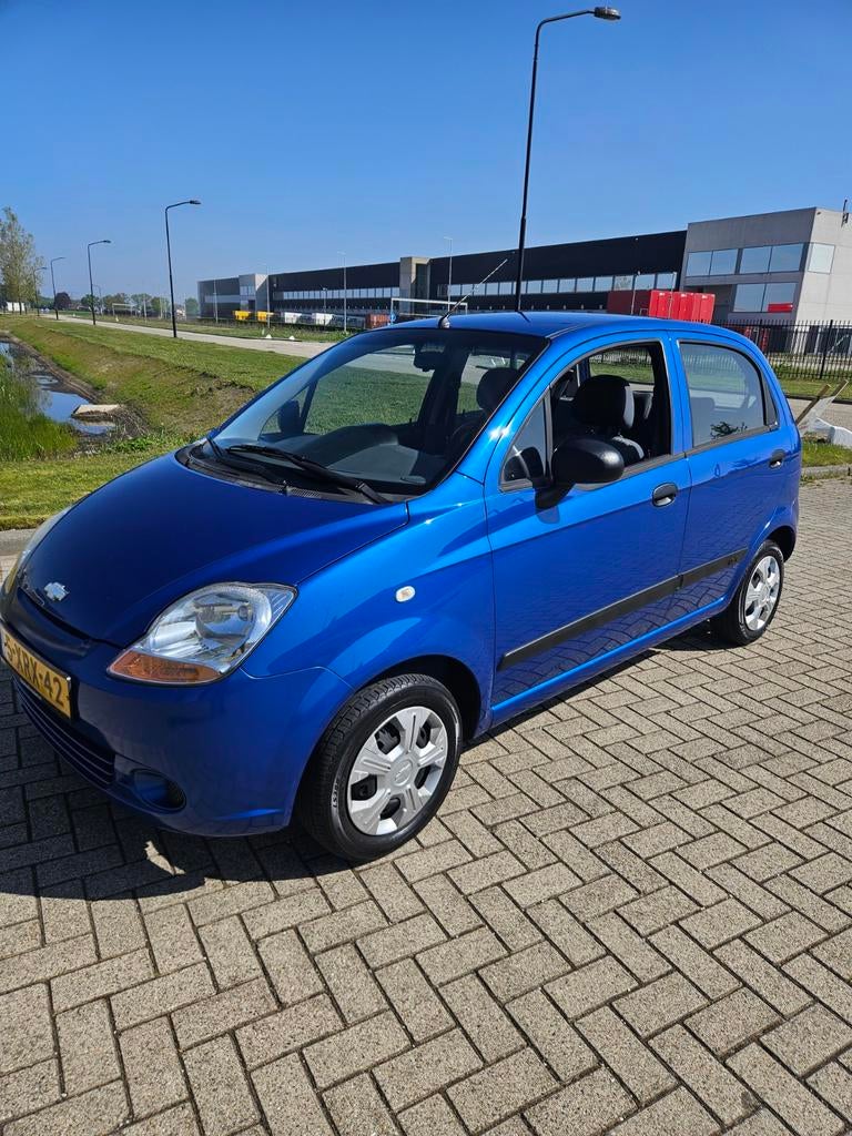 Chevrolet Matiz 0.8 2010 met nieuwe APK tot 20-04-2027, Auto's, Voorwielaandrijving, Stof, Blauw, Grijs